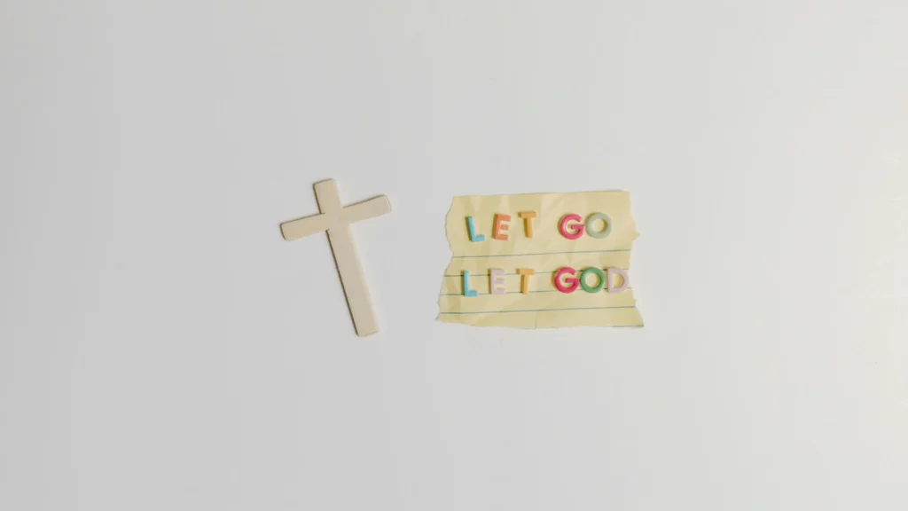 paper that says, "let go" "let God"
