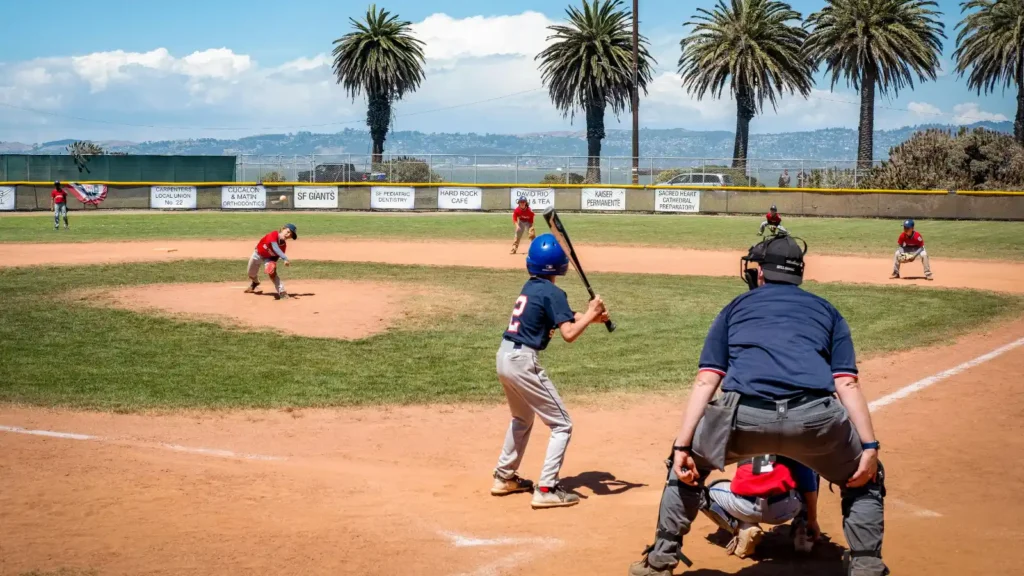 photo of kids playing little league baseball
