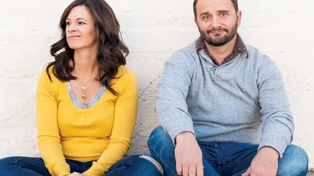 photo of a couple where the wife looks disengaged.